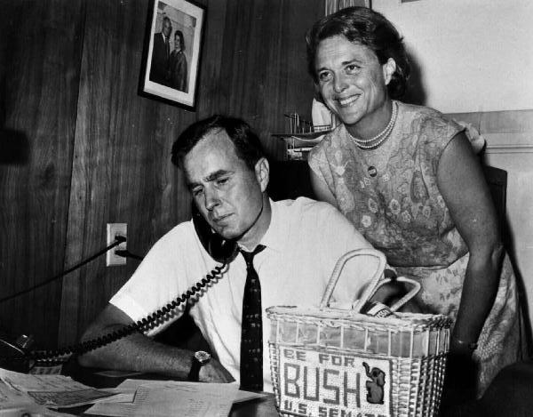 George and Barbara Bush campaign for Senate (note the needlepoint bag made by Mrs. Bush) 1964.jpg